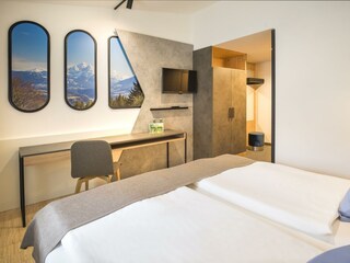 betten-im-doppelzimmer-plus-jufa-hotel-wipptal-1
