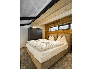 Schlafzimmer im oberen Geschoss