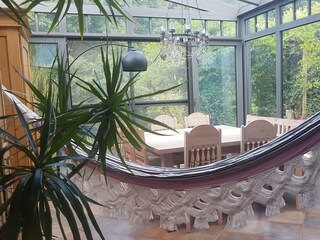 Wintergarten mit Hängematte