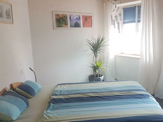 Schlafzimmer mit 1,60 m Doppelbett