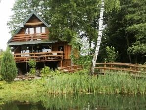 Maison de vacances Un gîte forestier à Laudanszczyzna au bord de la rivière - Étourneaux de Dolistowo - image1