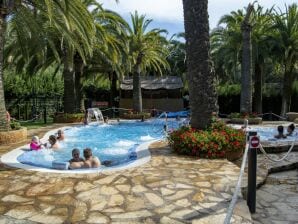 Ferienhaus Angenehmes Chalet in der Natur mit Balkon - Miami Playa - image1