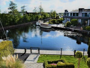 Vakantiehuis 192-BREKKENSE WIEL - posizione soleggiata - incl. pontile per barche di 10m