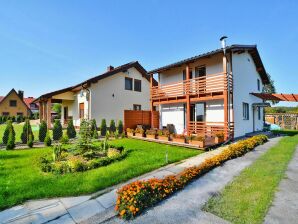 Parc de vacances Maison de vacances avec jardin bien entretenu, et vue sur le lac à Dabrowica - Czaplinek - image1