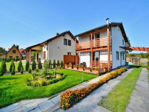 Parc de vacances Maison de vacances avec jardin bien entretenu, et vue sur le lac à Dabrowica - Czaplinek - image1