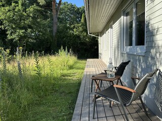 Sitting in front of the house