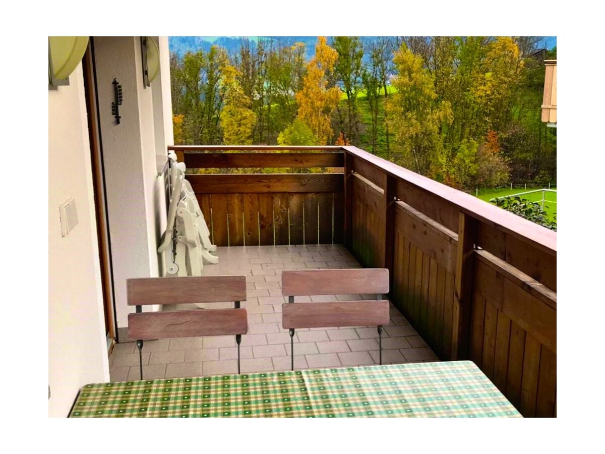 25 mq balcony with table and deck chairs