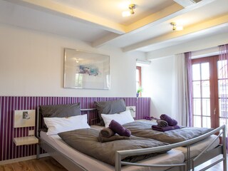 Schlafzimmer mit französischem Balkon