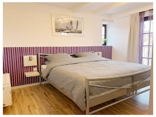 Schlafzimmer mit französischem Balkon