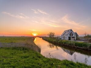 Holiday house Cosy holiday home with garden - Oudeschild - image1