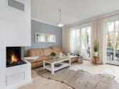 Cozy living room with gas fireplace and sofa