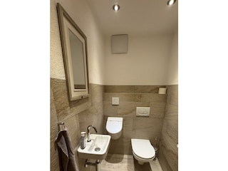 Separates Wc mit Pissoir