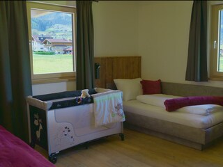 Bedroom with cot_1.3.1