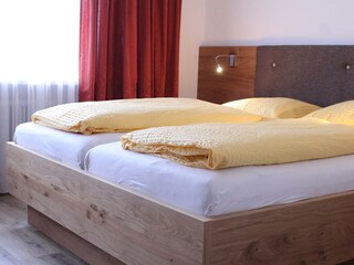 Schlafzimmer der Ferienwohnung Neu