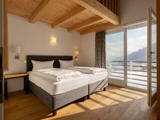 Schlafzimmer mit Balkon
