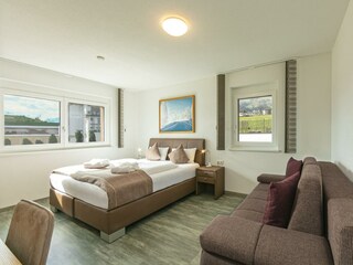 Schlafzimmer mit zusätzlicher Schlafcouch H19