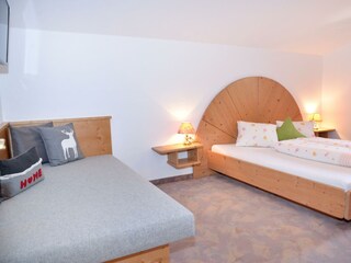 Schlafzimmer mit Zusatzbett | Appartement Tristner