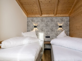 Schlafzimmer Apartment Edelweiss Zweibettzimmer