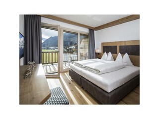 Alpinliving.Tirol Schlafzimmer Adlerhorst u. Gipfe