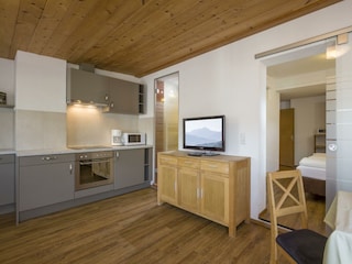 Familienhotel_Seetal_Ferienwohnung_Almrose_Wohnkue