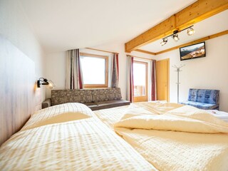 Schlafzimmer 1 der Wohnung Panorama