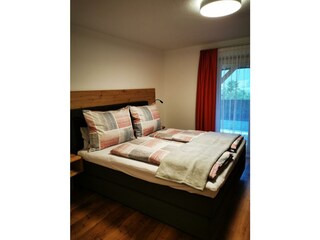 Schlafzimmer mit Balkon