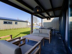 Holiday park Luxury Docklodge on the water - Delfstrahuizen - image1