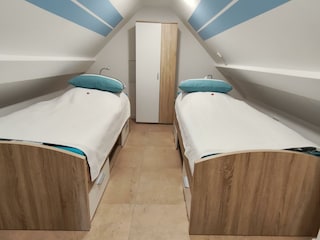 Schlafzimmer im Spitzboden