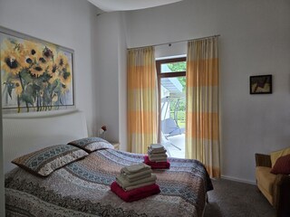 Schlafzimmer mit Doppelbetten