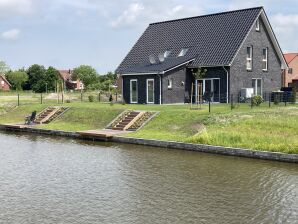 Ferienhaus Grachtenpanorama I - direkte Wasserlage - Greetsiel - image1
