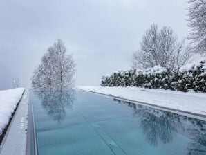 Parco vacanze Appartamento chic con piscina a sfioro - San Martino al Tennengebirge - image1