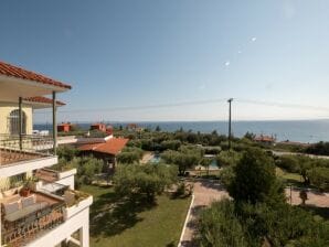 Parc de vacances Appartement en duplex avec piscine commune à Gerakini - Gérakini - image1