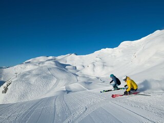 Skigebiet_Skifahrer Gipfel