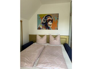 Unfolded sofa bed in the second bedroom