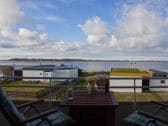 Ausblick vom Balkon der Ferienwohnung Inselblume 83 auf die Fehmarnsundbrücke und die Ostsee