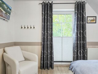 Schlafzimmer mit Doppelbett