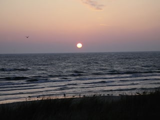 Erleben Sie die Sonnenuntergänge am Strand