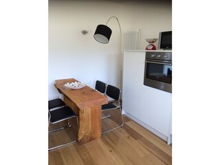 Kitchen with dining area made from local woods