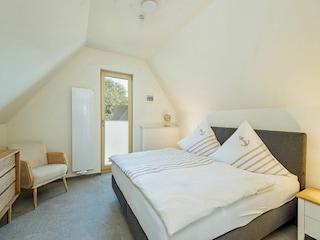 Your Darß vacation in Born: bright bedroom