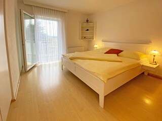 Bedroom with large balcony