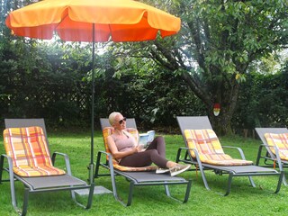 Quiet sunbathing lawn in the garden