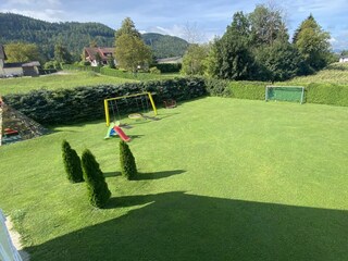 Large play area with football goal