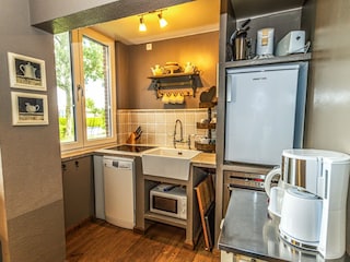 Große Küche mit toller Einrichtung im maritimen-englischen-Stil