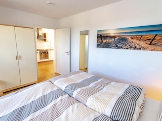 Gemütliches Schlafzimmer mit Doppelbett