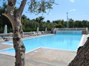 Parc de vacances Bungalow dans un resort à Lido del Sole avec terrasse - Rodi Garganico - image1