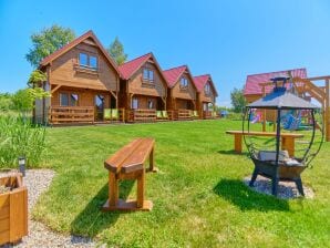 Ferienhaus Weelderig huisje op 600 meter van het strand in Niechorze