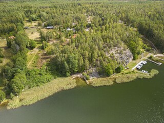 View house and coastline with a boat dock and beach