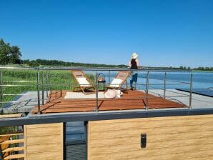 Luxe woonboot voor 2 personen, aan zee.