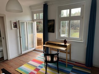 Balkonzimmer mit Schreibtisch