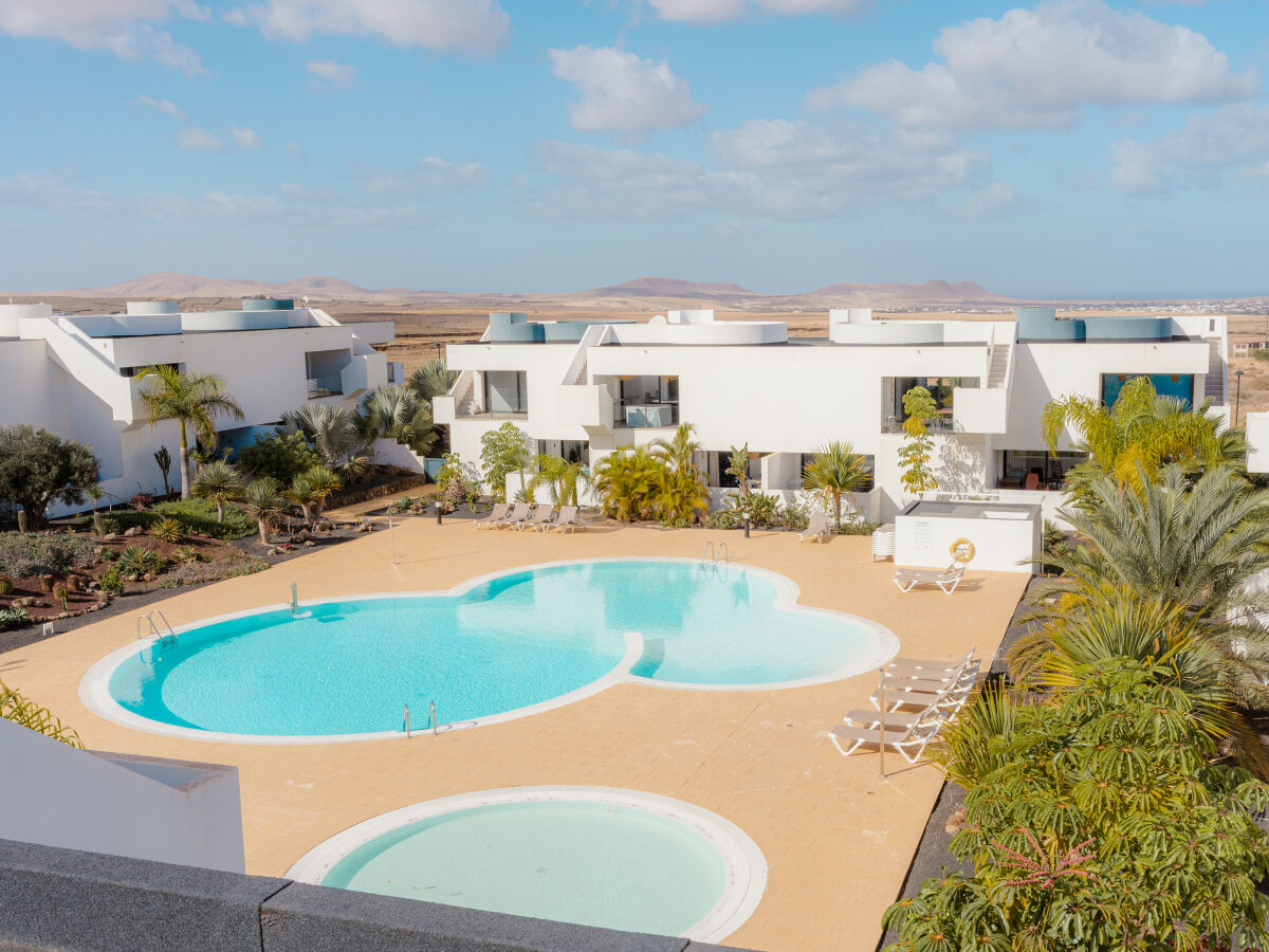 View of the pool looking from the balcony